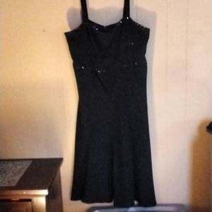 A black dress w/black beads
